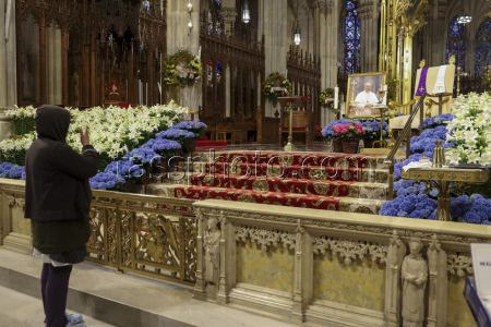 People visit St. Patrick's Cathedral to pay their respects to the late Pope Francis
