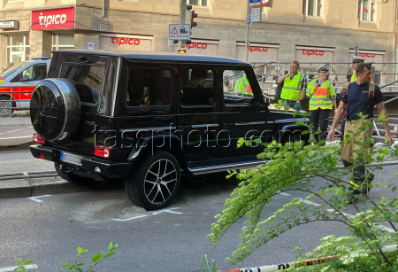 Car drives into group of people