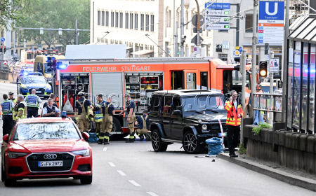 Car drives into group of people