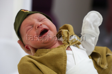 Newborns dressed in military uniform in Kemerovo, Russia
