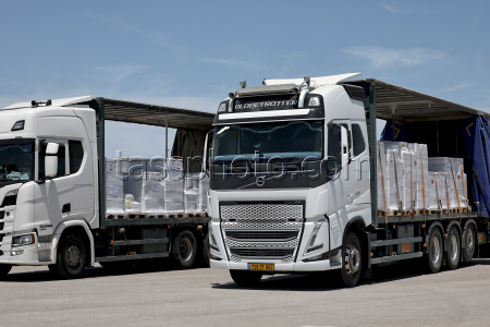 Trucks with humanitarian aid for Gaza wait at Israel's Kerem Shalom crossing