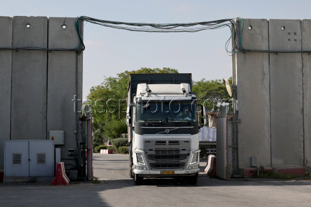 Trucks with humanitarian aid for Gaza wait at Israel's Kerem Shalom crossing