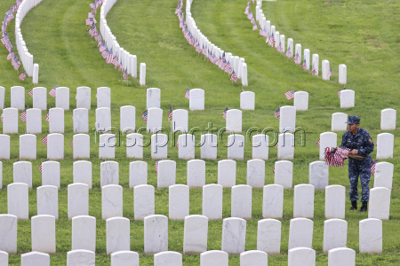 Flags placed on military veteran graves for Memorial Day in Brooklyn