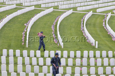 Flags placed on military veteran graves for Memorial Day in Brooklyn