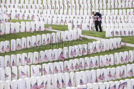 Flags placed on military veteran graves for Memorial Day in Brooklyn