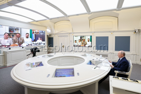 Russia's President Putin meets with families awarded Orders of Parental Glory